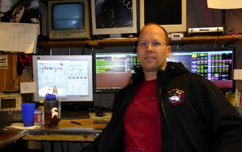 Robert Schwarz, of the University of Minnesota-Twin Cities College of Science and Engineering, at his South Pole workstation